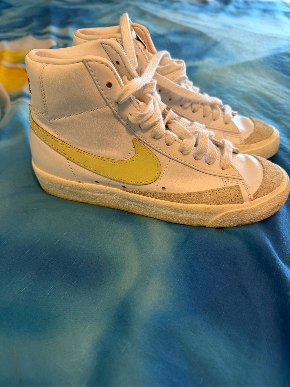 Nike White High-Top Sneakers with Yellow Swoosh